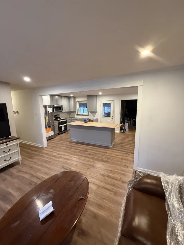 Open-concept kitchen remodel with new cabinetry and island under construction in Abingdon, VA