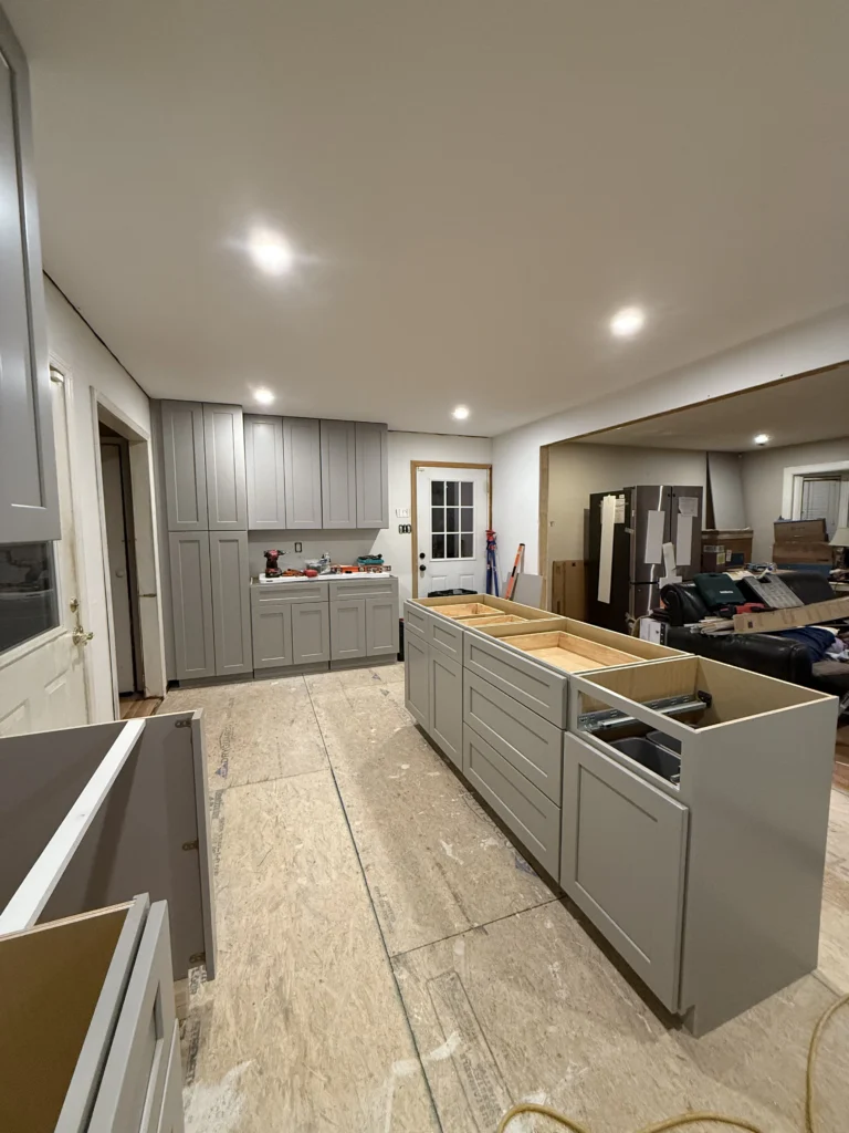 New gray kitchen cabinets and island during a kitchen remodel in Abingdon, VA