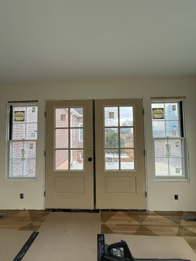 New French patio doors with custom window trim installed in a Bristol, VA home