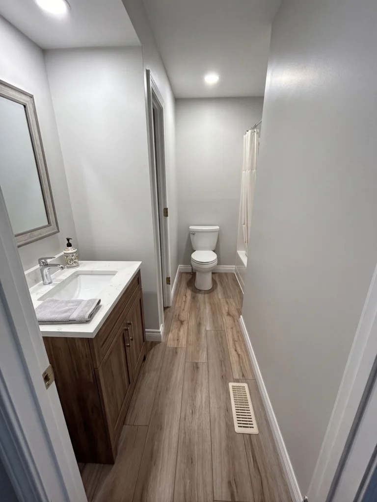 Finished bathroom remodel with new vanity and updated flooring in Kingsport, TN