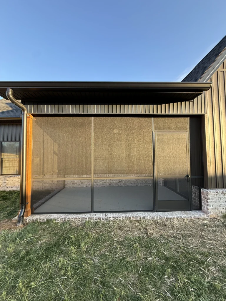 Front view of a completed screened porch installation on a new construction home in Gray, TN