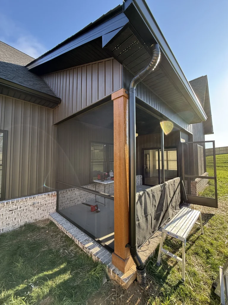 Screened porch construction with black aluminum framing before screen installation in Gray, TN