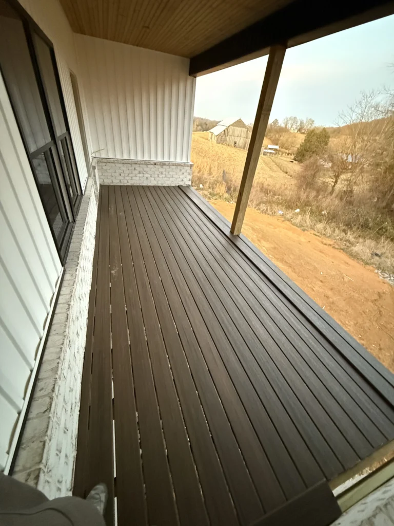 Finished Trex composite covered porch installation at a new construction home in Gray, TN