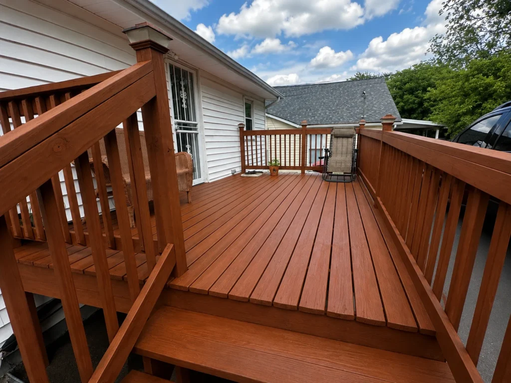 Finished wood deck with cedar-toned decking and custom railings in Johnson City, TN