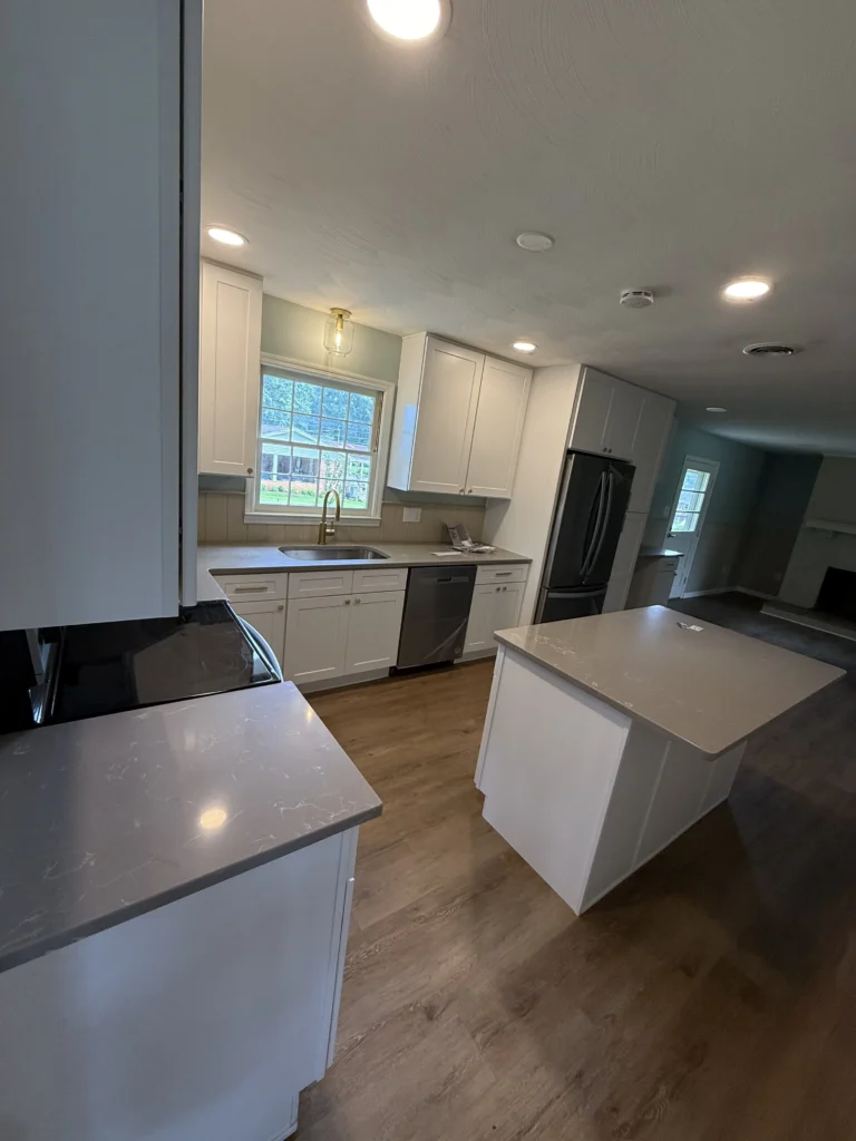 White shaker cabinets and stainless refrigerator in Johnson City kitchen remodel