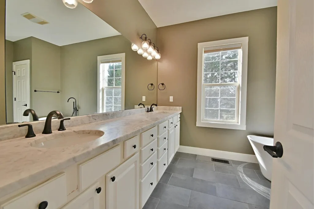 Double vanity with quartz countertop in Knoxville master bathroom