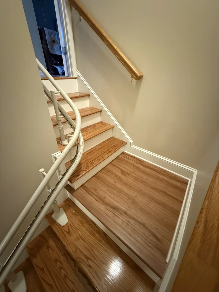 New hardwood staircase landing after Kingsport flooring remodel