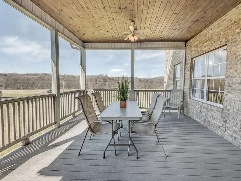 Screened porch installation with composite decking and wood ceiling in Strawberry Plains TN